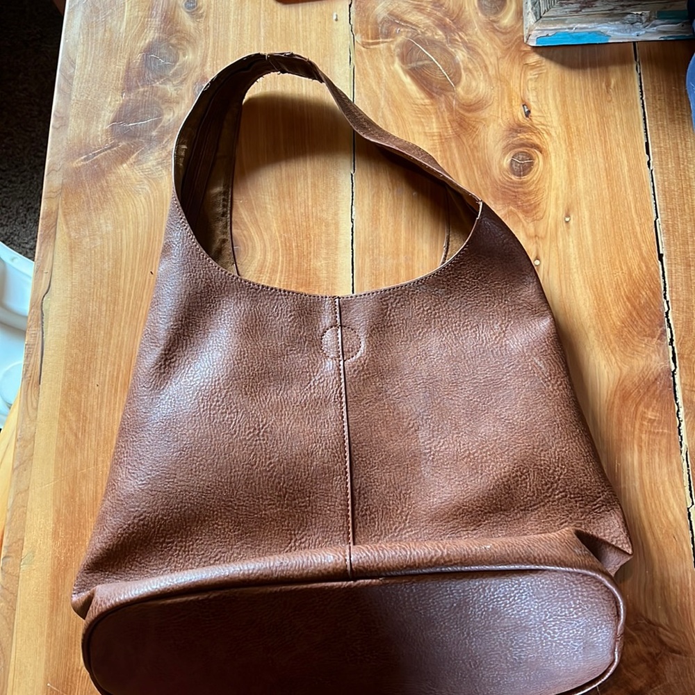 Plain faux leather brown bag.